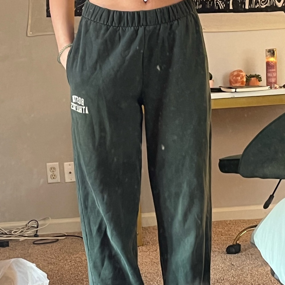dark green sweatpants